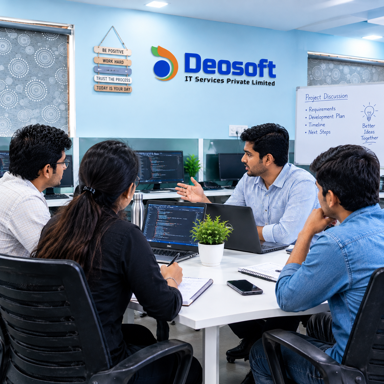 Deosoft IT team participating in a group discussion and collaborative project meeting